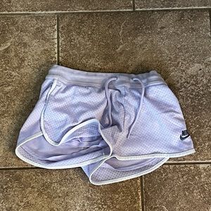 Purple Nike shorts